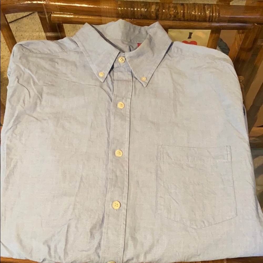 Light blue buttoned down collard shirt